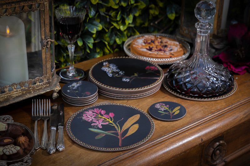 Delany placemats and coasters on a laid sideboard
